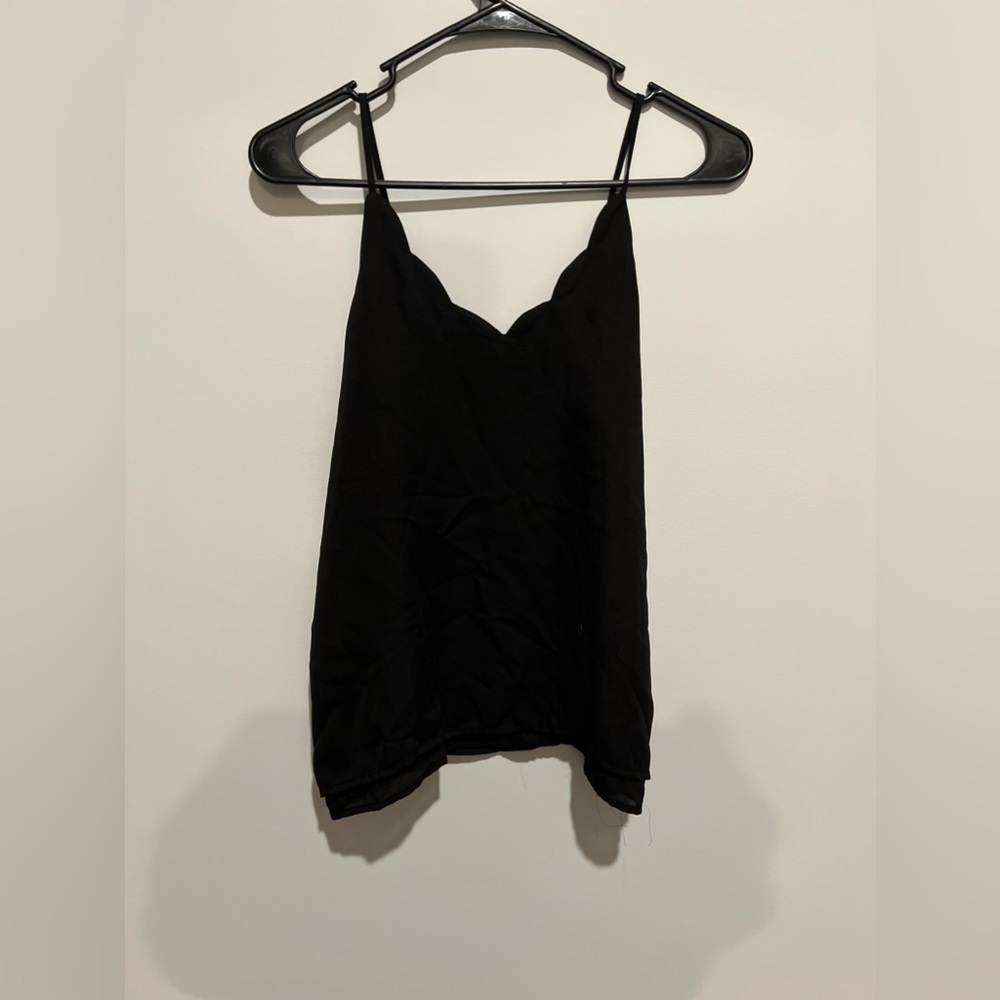 Black tank top with ribbed to border seam